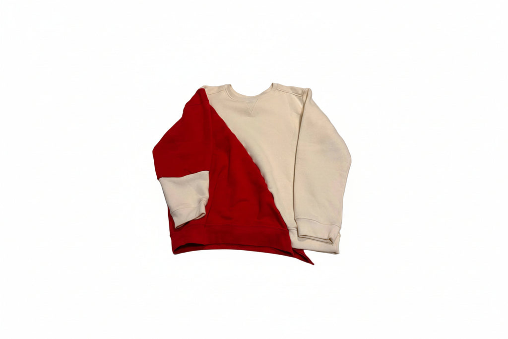 Folded red and beige fabric on a white background